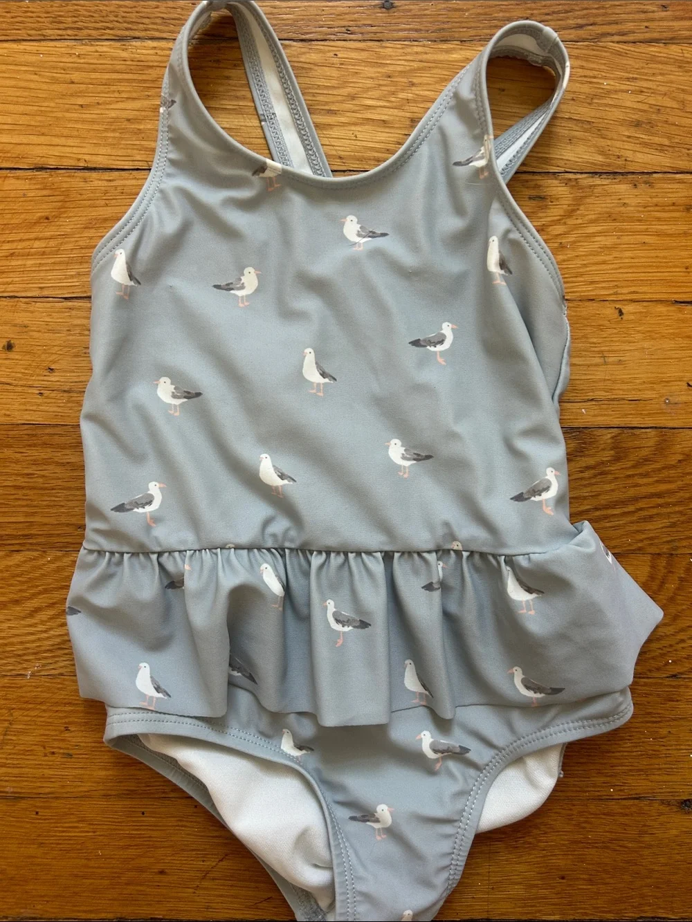 Two Little Planet swimsuits